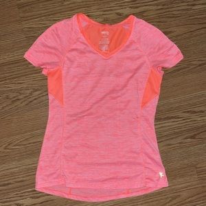 Bright orange workout top